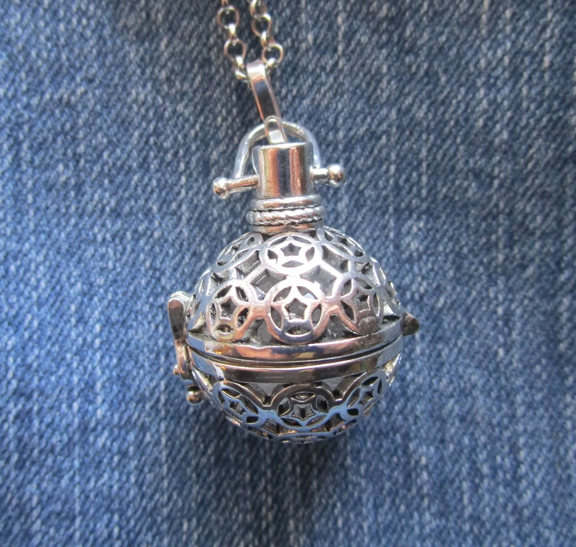 Caged Silver Stars Quartz Crystal Ball Pendant Necklace